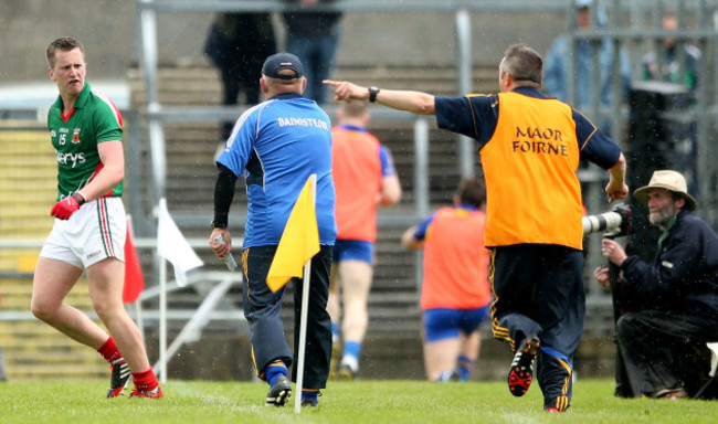 Cillian O'Connor has words with manager John Evans during the second half