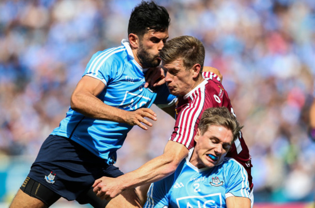 Cian O’Sullivan and Michael Fitzsimons with John Heslin