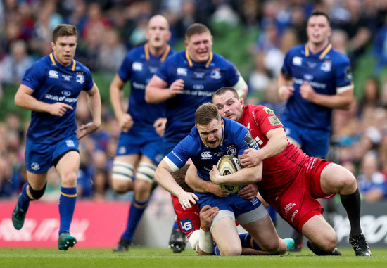 Rory O'Loughlin tackled by Ken Owens