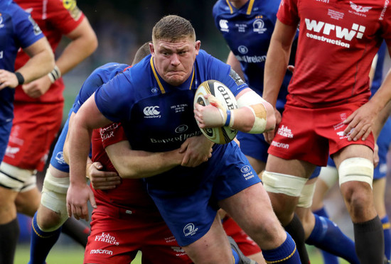 Tadhg Furlong tackled by Ken Owens