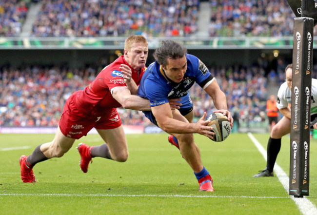 James Lowe scores his sides second try despite the efforts of Johnny Mcnicholl