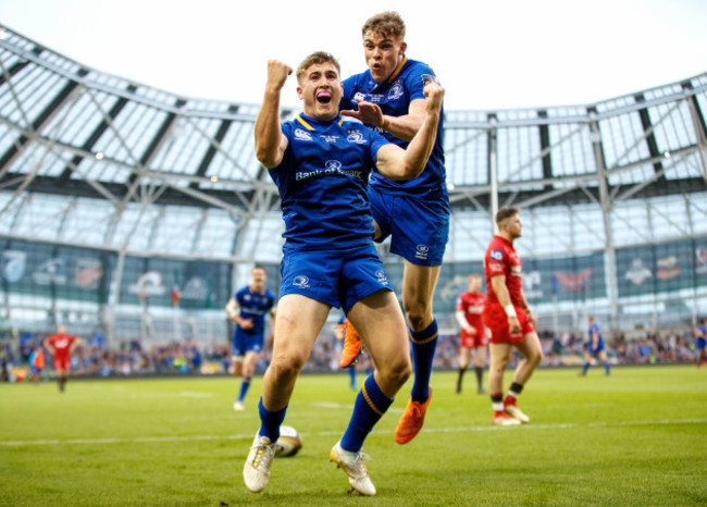 Jordan Larmour celebrates his try with Garry Ringrose