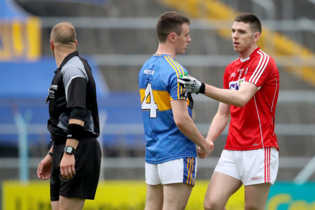 Alan Campbell shakes hands with Luke Connolly of Cork after the game