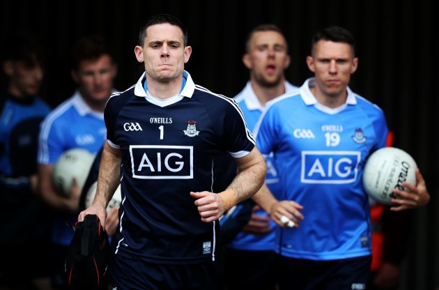 Stephen Cluxton leads out his team