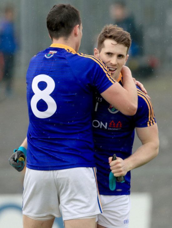 Darren Gallagher celebrates with Liam Connerton at the final whistle