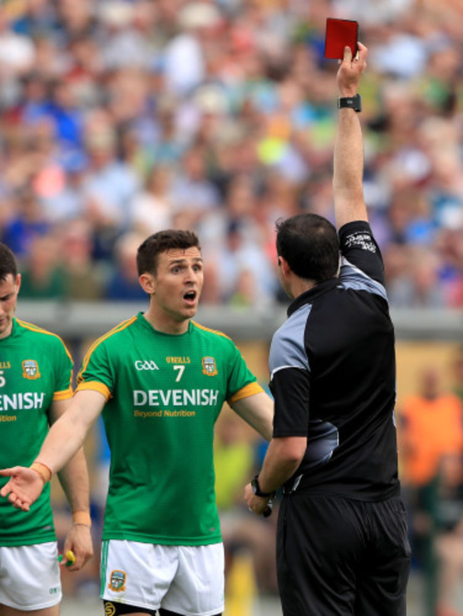 Shane McEntee is shown a red card by referee Sean Hurson