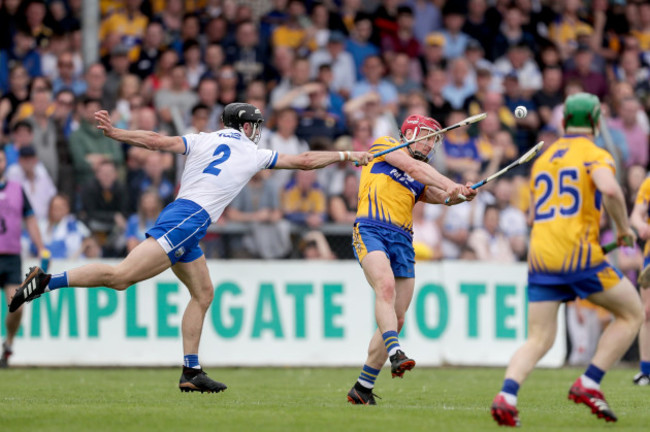 John Conlon scores a point despite Shane Fives