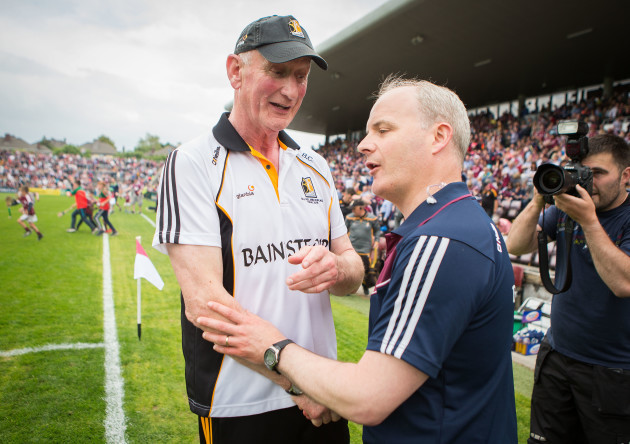 Micheál Donoghue shakes hands with Brian Cody after the game