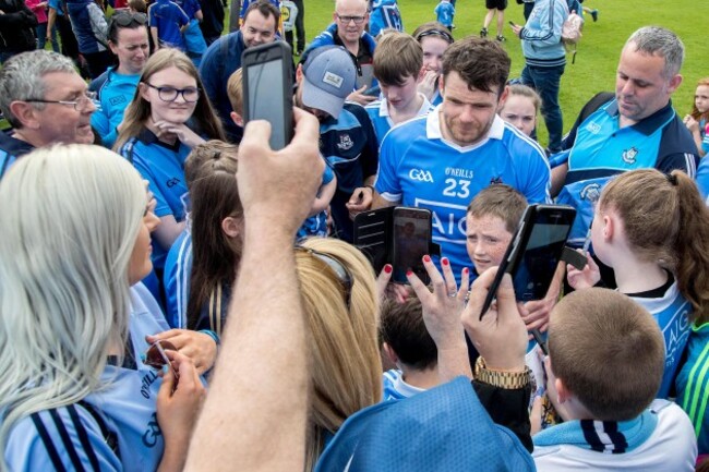 Kevin McManamon with fans after the game