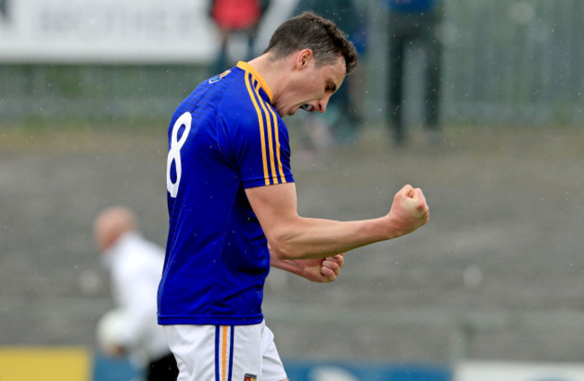 Darren Gallagher celebrates at the final whistle