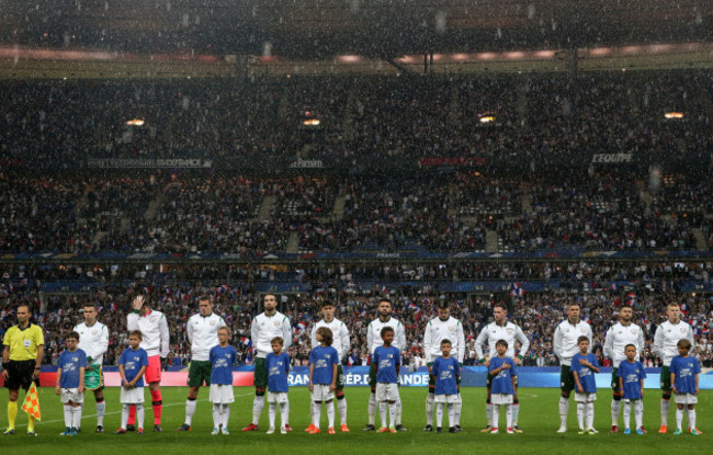 The Ireland team stand for the national anthems