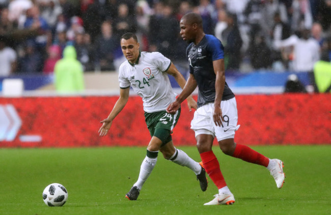 Graham Burke with Djibril Sidibe