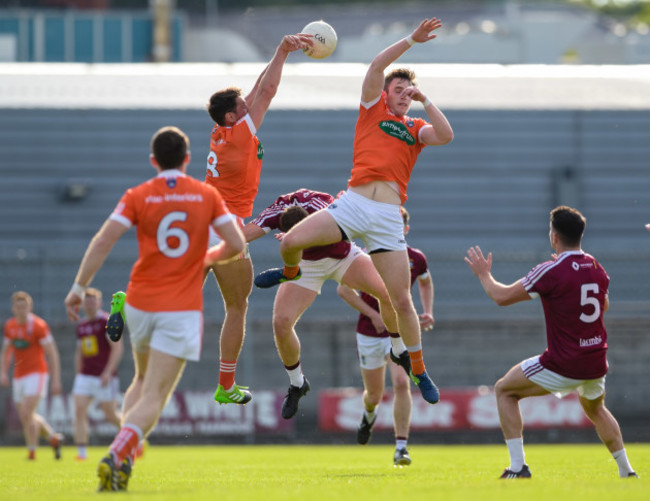 Ger Egan competes for a kick out with Stephen Sheridan and Ciaran O’Hanlon