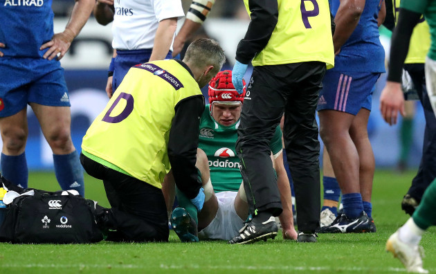 Josh van der Flier receives attention for an injury