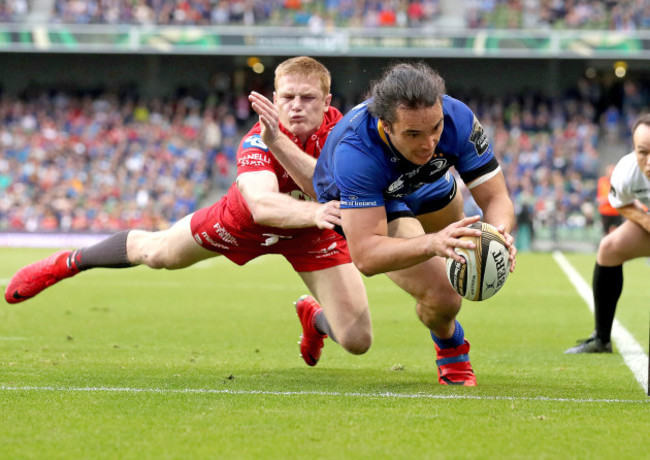 James Lowe scores his sides second try despite the efforts of Johnny Mcnicholl