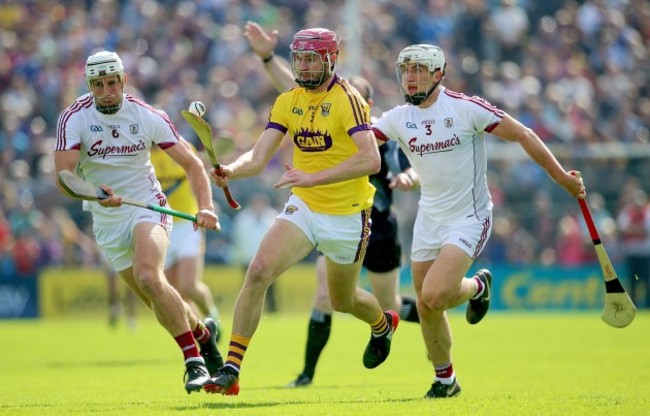 Paudie Folen with Daithi Burke and Gearoid McInerney