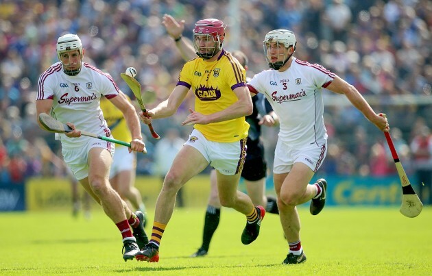 Paudie Folen with Daithi Burke and Gearoid McInerney