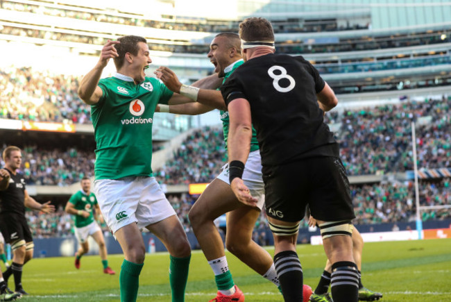 Ireland’s Simon Zebo celebrates scoring a try with Jonathan Sexton