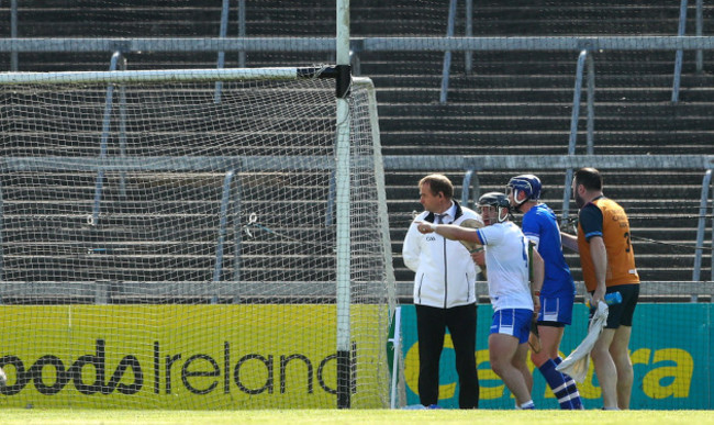 Noel Connors and goalkeeper Stephen O'Keeffe argue with the umpire after a goal was awarded