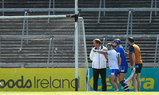 Noel Connors and goalkeeper Stephen O'Keeffe argue with the umpire after a goal was awarded