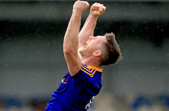 Michael Quinn celebrates at the final whistle