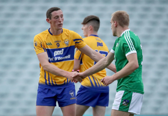 Sean O’Dea shakes hands with Cathal O’Connor after the game