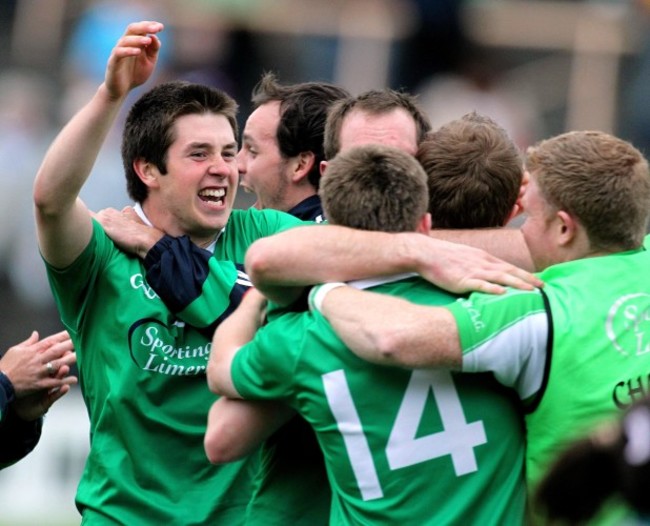 John Riordan celebrates with teammates at the final whistle