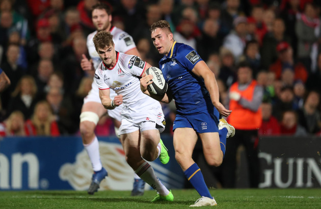 Leinster’s Jordan Larmour runs in to score a try from Ulster’s Aaron Cairns