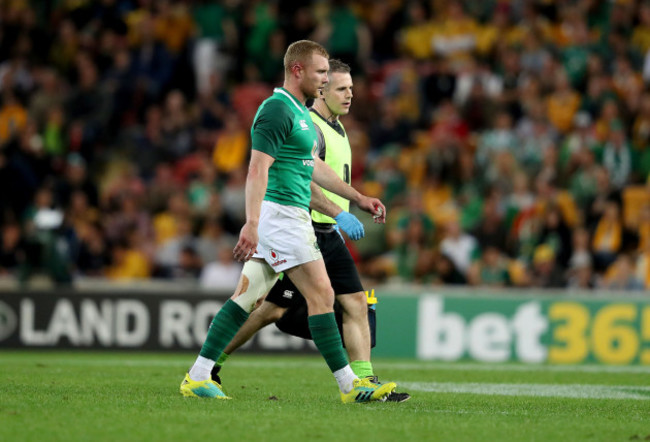 Keith Earls leaves the field with an injury