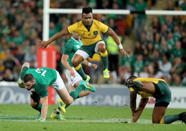 Robbie Henshaw tackled by Will Genia and Marika Koroibete