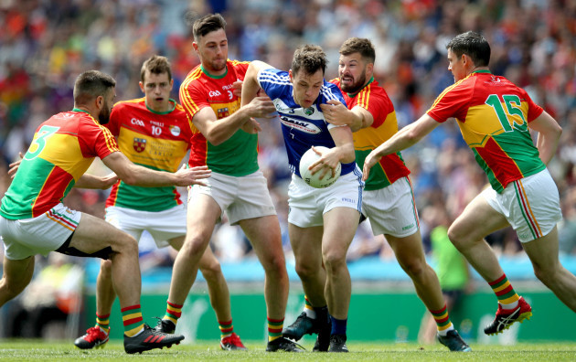 John O'Loughlin under pressure from the Carlow defence