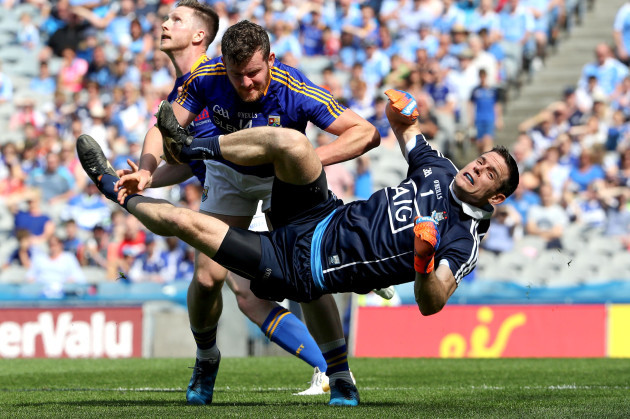 Stephen Cluxton is fouled by James McGivney