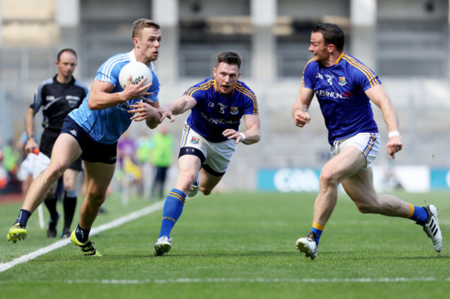 Paul Mannion with Michael Quinn and Donal McElligott