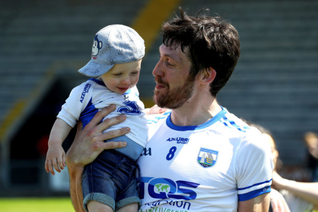 Tommy Prendergast celebrates after the game with his son Tom