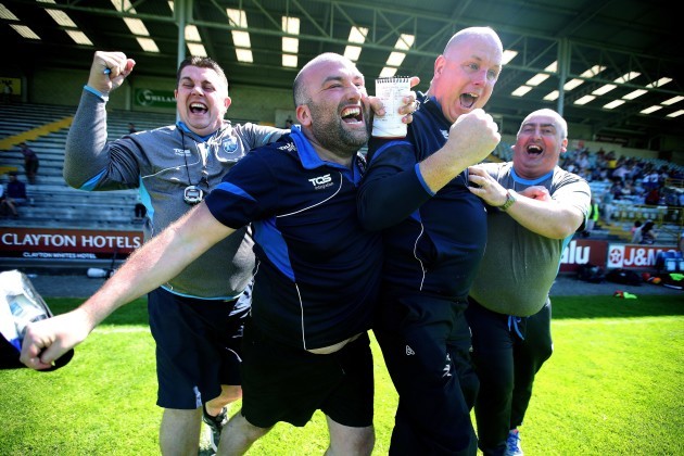 Tom McGlinchey and his back room team celebrate at the final whistle