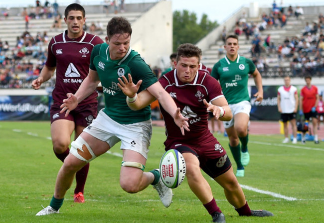 Jack Dunne attempts to win the ball