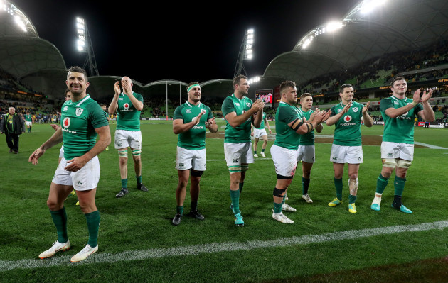 The Ireland players applaud the supporters after the game