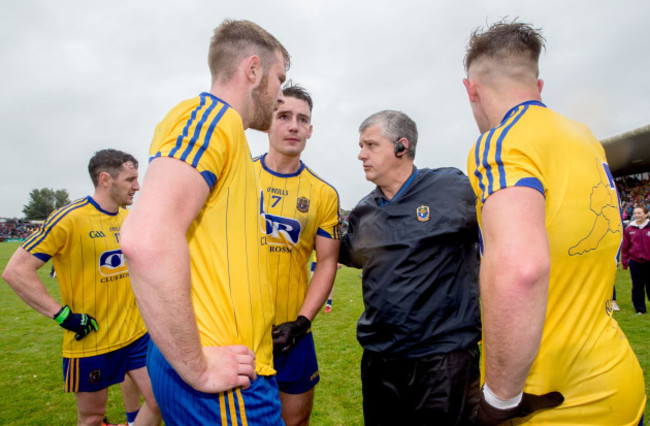 Thomas Corcoran, John McManus and Sean Mullooly speak with joint manager Kevin McStay after the game