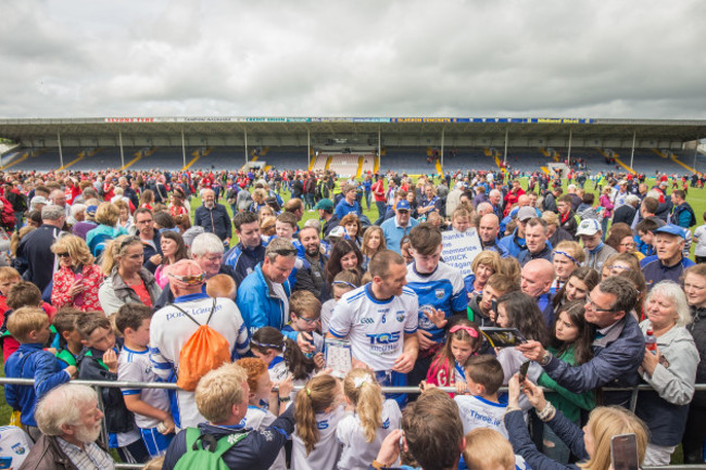 Michael Walsh with fans after the game