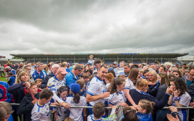 Michael Walsh with fans after the game