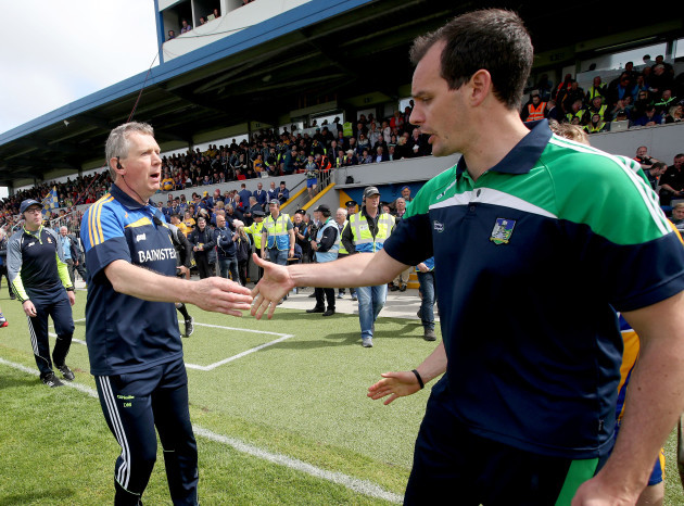 Donal Moloney and Paul Kinnerk shake hands after the match