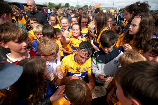 Peter Duggan signs autographs after the game