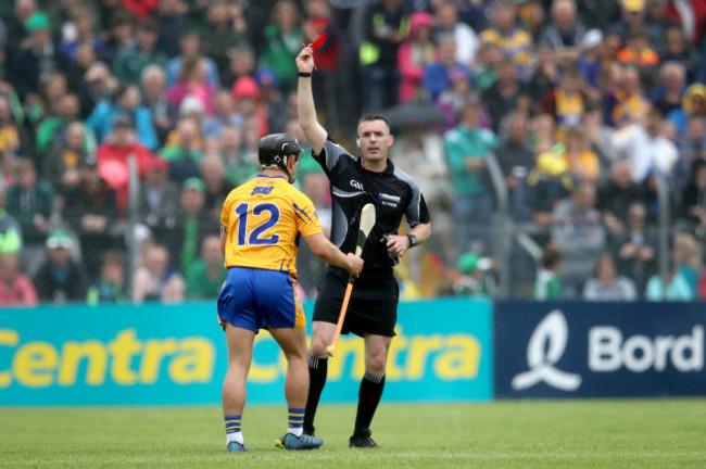 David Reidy is shown a red card by Referee James Owens