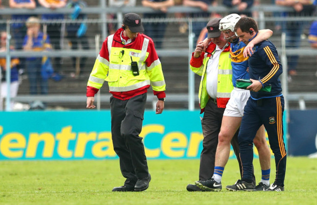 Brendan Maher leaves the field injured