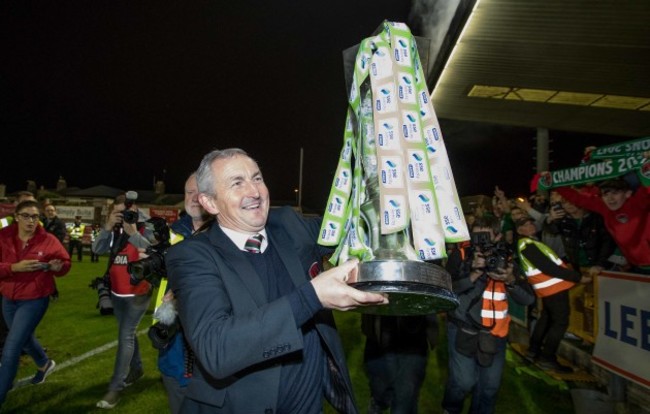 John Caulfield celebrates with the trophy