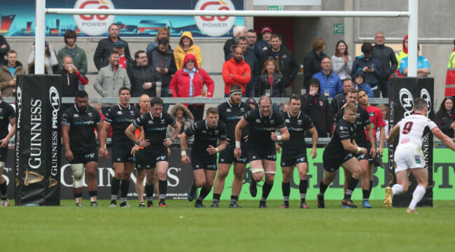 Osprey's team run at Ulster&rsquo;s John Cooney as he kicks a conversion