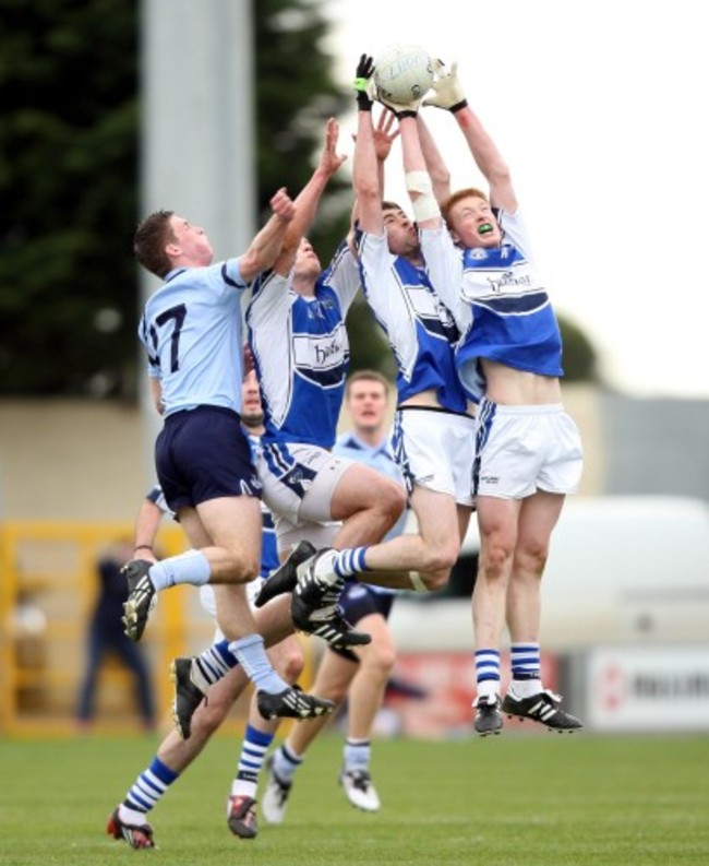 Brian Glynn of Laois claims midfield ball