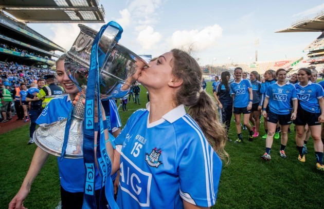 Noelle Healy kisses the Brendan Martin Cup