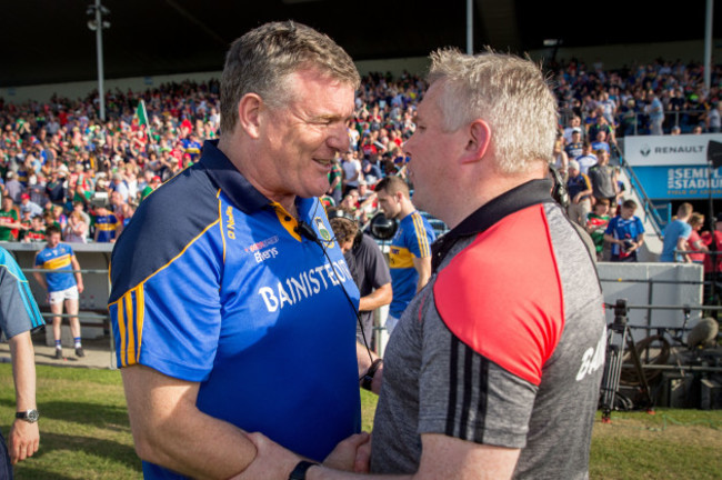 Stephen Rochford shakes hands with Liam Kearns after the game