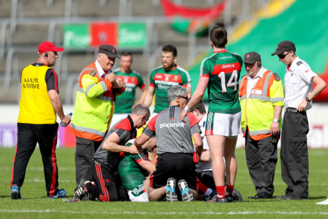 Seamus O’Shea receives medical attention